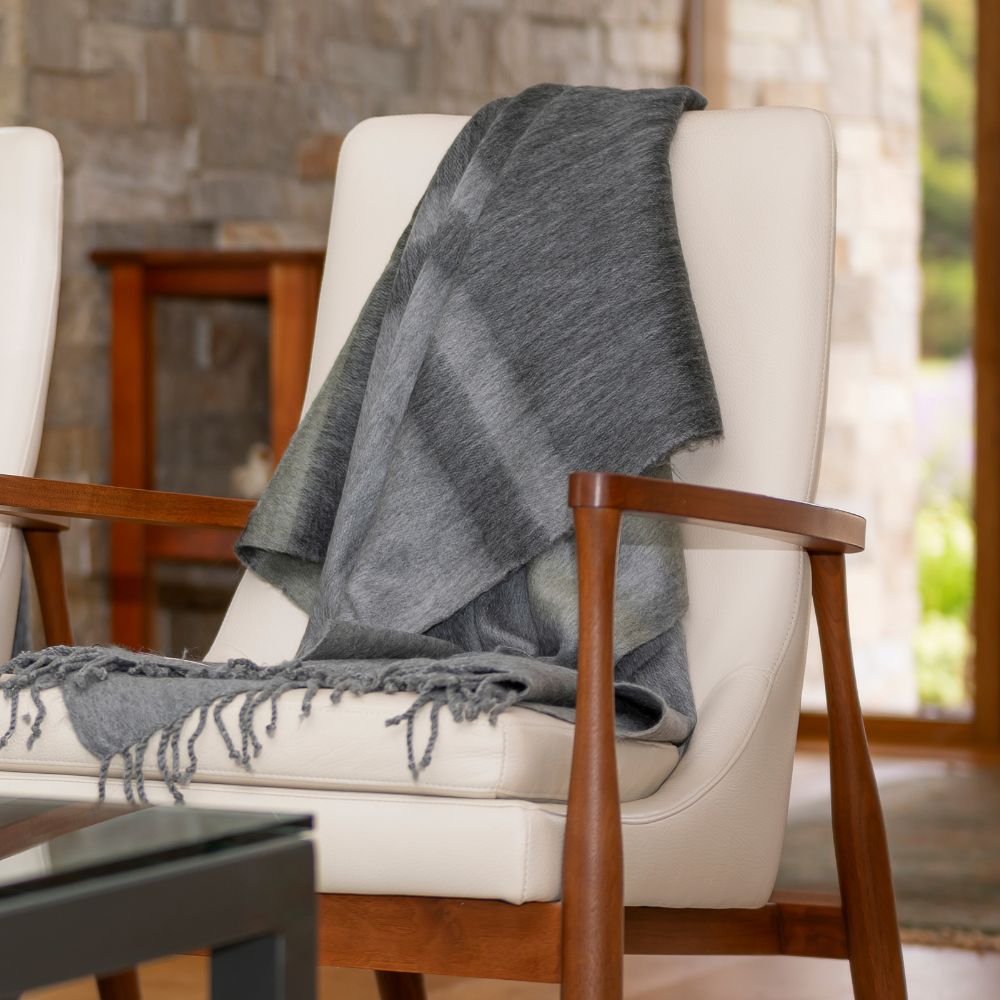 Dark grey handwoven throw on chair