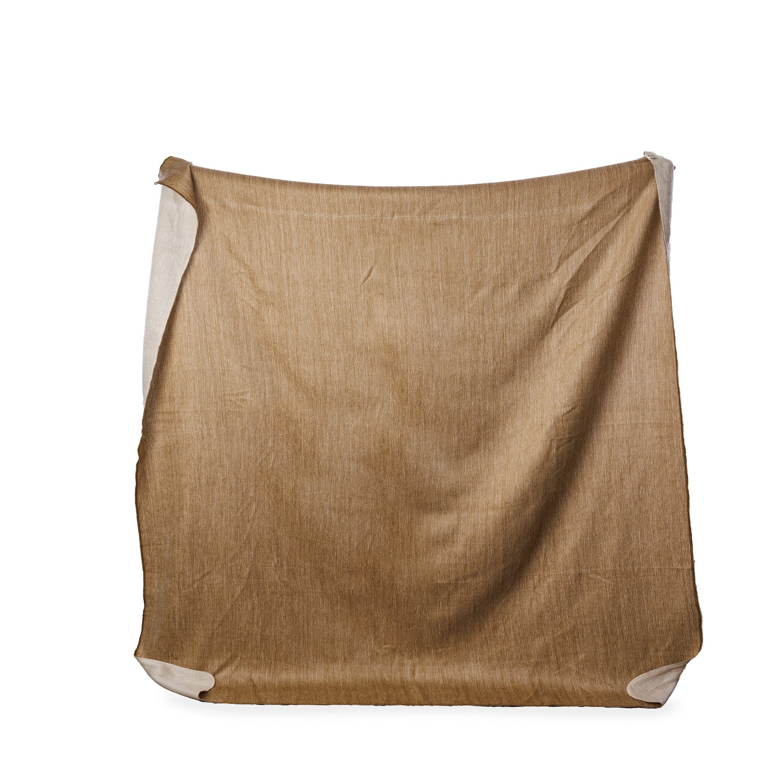 A reversible throw blanket with one side in camel color and the other in a cream color, displayed flat.
