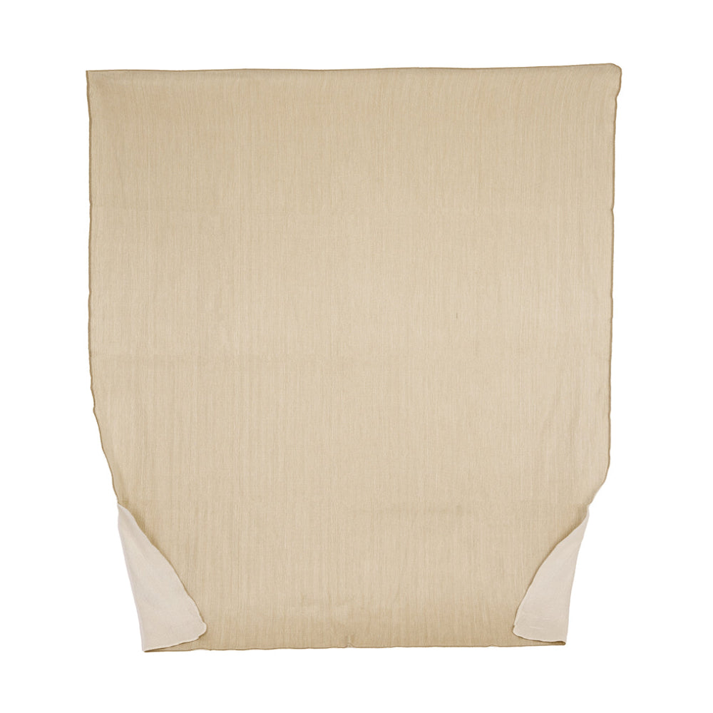 A reversible natural tobacco and white throw blanket made from alpaca yarn, displayed flat.