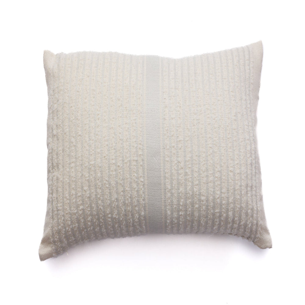 A rectangular throw pillow with a handloomed alpaca design in silver and ivory colors.
