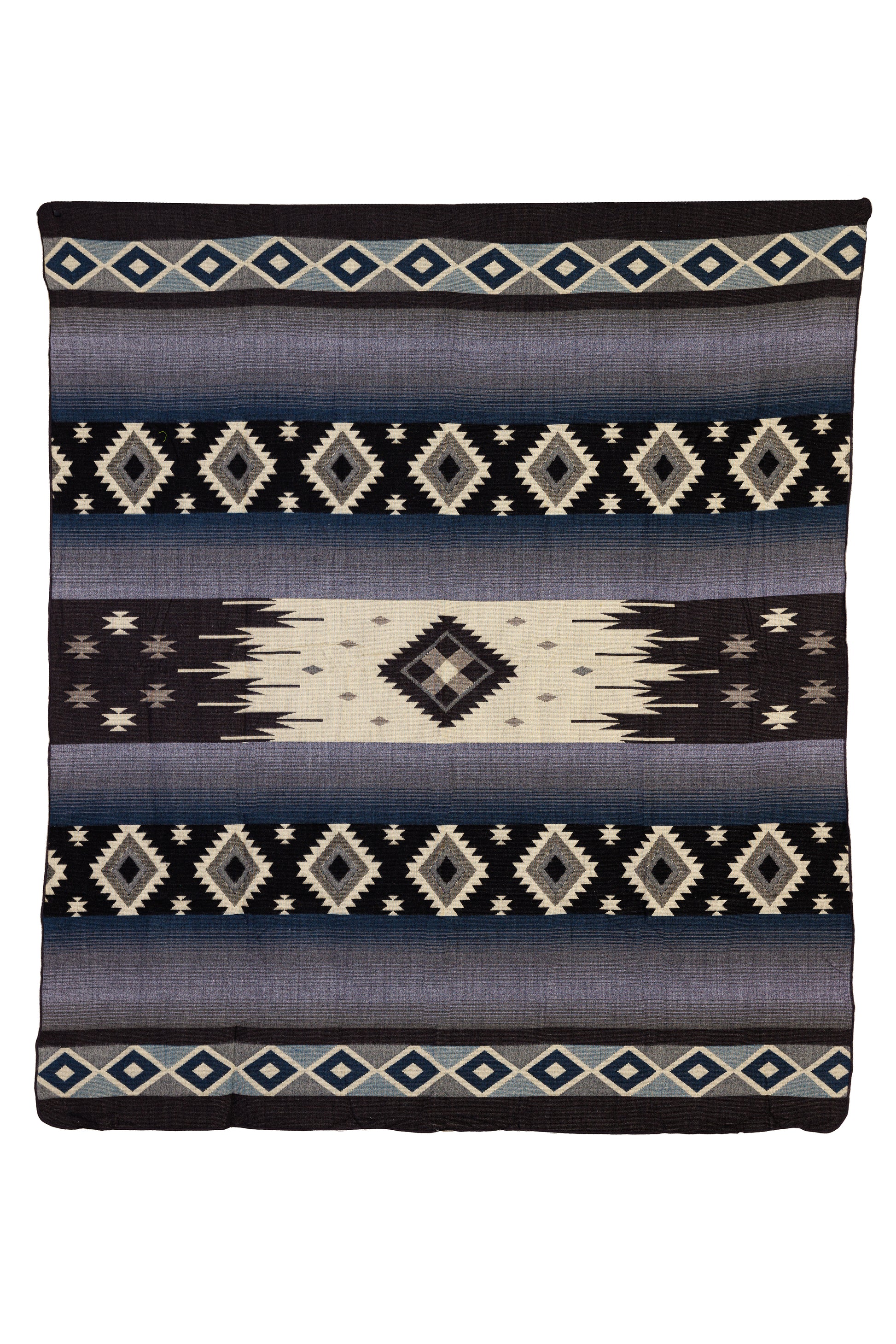 A woven blanket with geometric diamond patterns in dark blue, gray, and black colors.