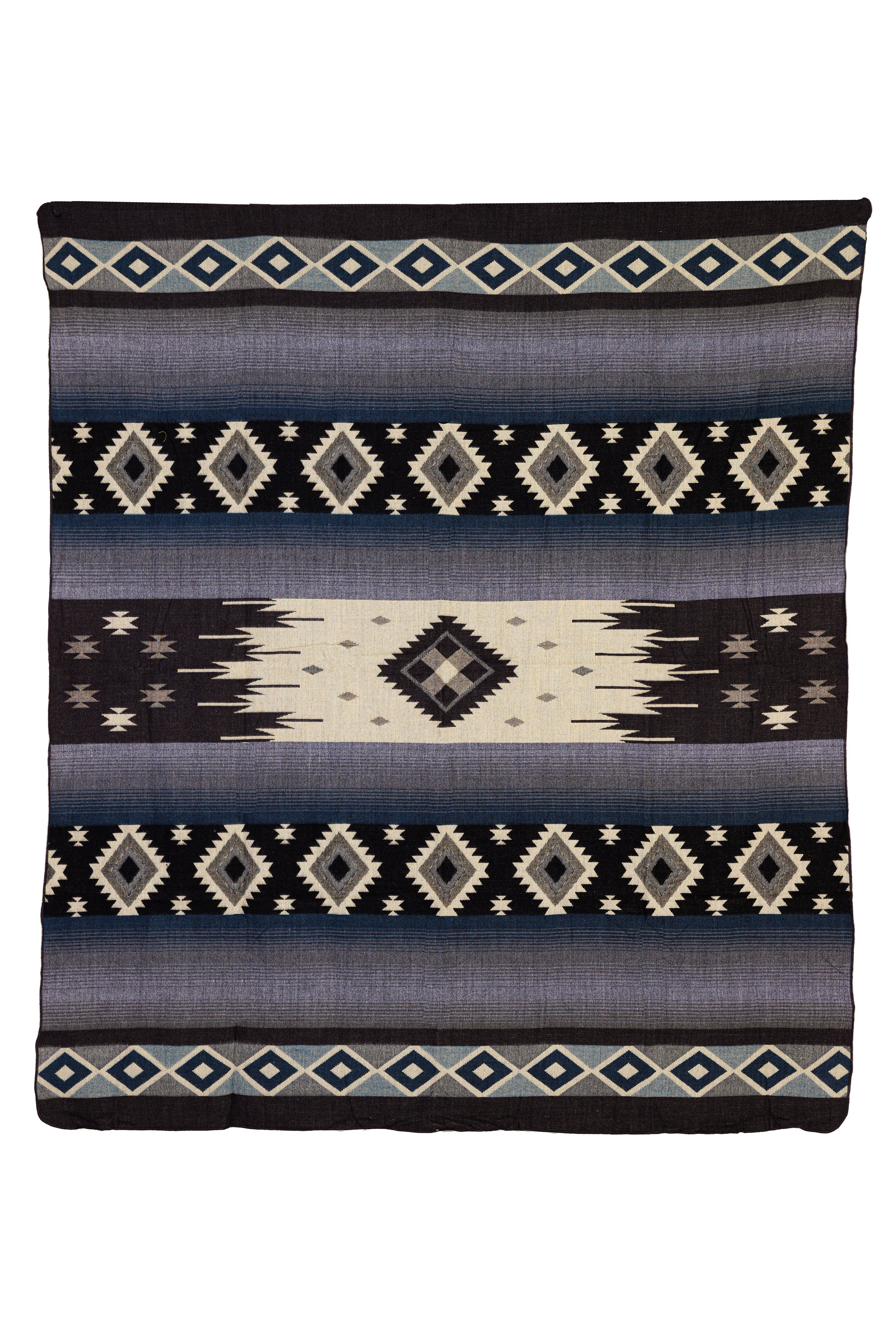 A woven blanket with geometric diamond patterns in dark blue, gray, and black colors.