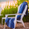 Artisanal blue woven throw on patio chair
