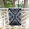 Navy artisanal woven throw with geometric design