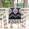 artisanal woven throw with blue pattern