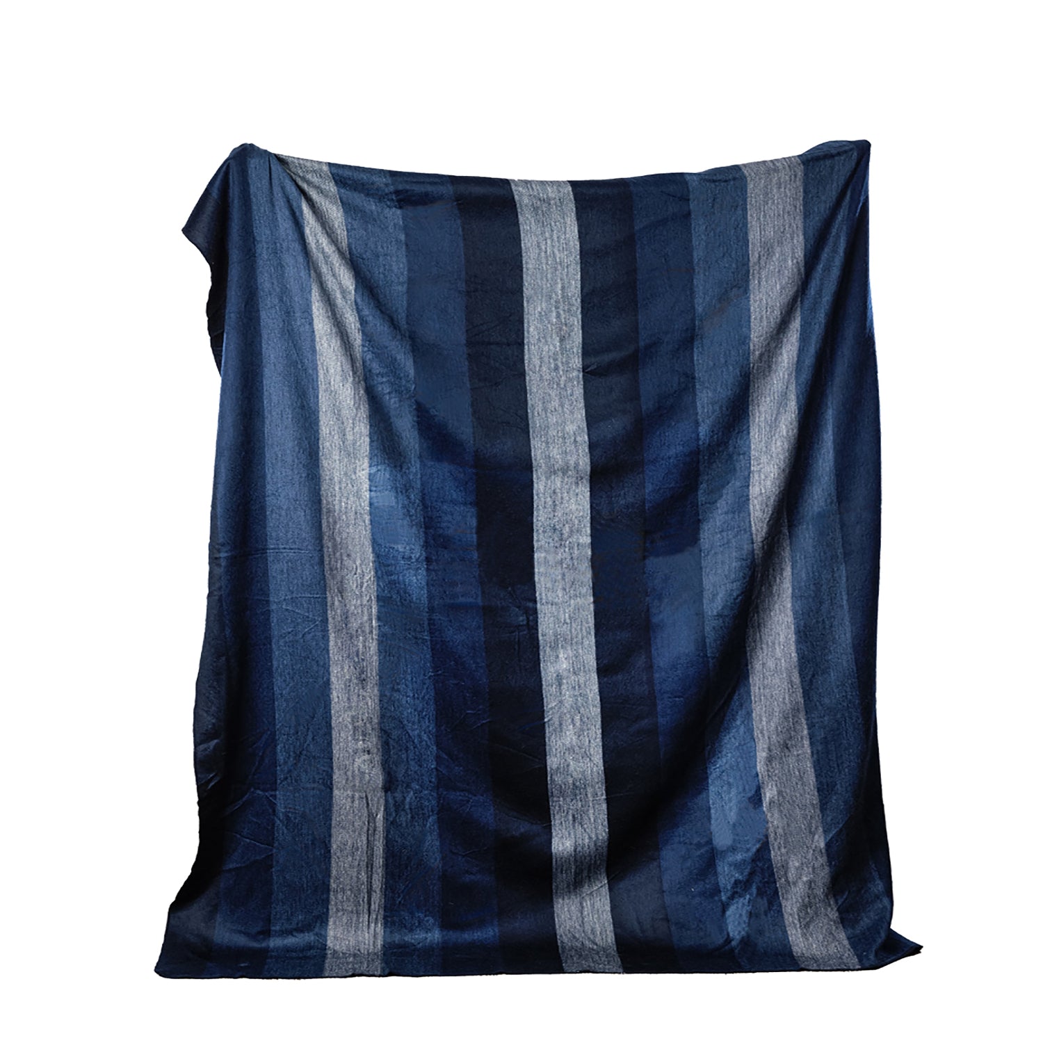 A woven throw blanket with stripes in shades of dark blue to navy, displayed against a white background.