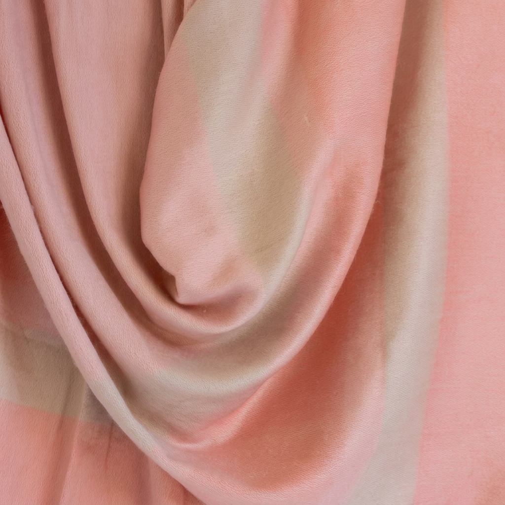 Close-up of Faded Coral alpaca throw with eyelash trim, Kallpa Collection