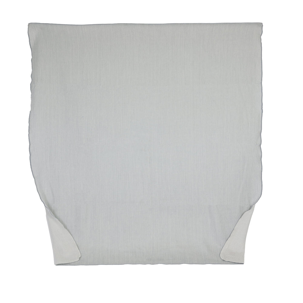 A reversible glacier gray and white throw blanket made from alpaca yarn, displayed flat.