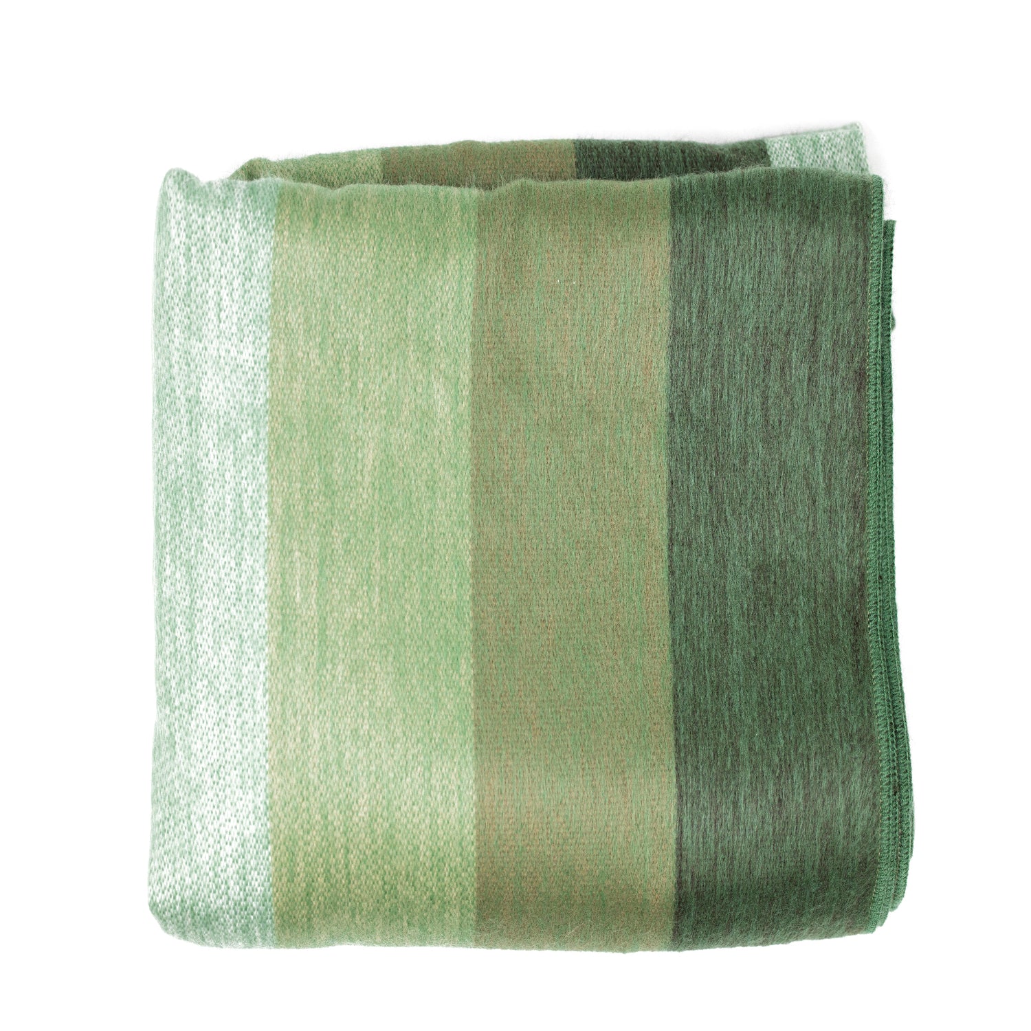 A folded throw blanket in shades of green, including light green, sage, and darker greens, displaying a soft and lustrous texture.