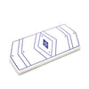 A rectangular tray with a geometric design, featuring inlaid lapis and mother of pearl stones, on a white background.